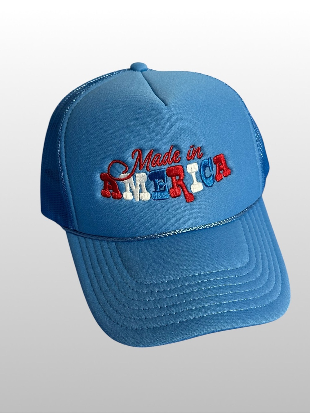OTTO.  Light Blue Mesh trucker hat with “Made in America” stitching
